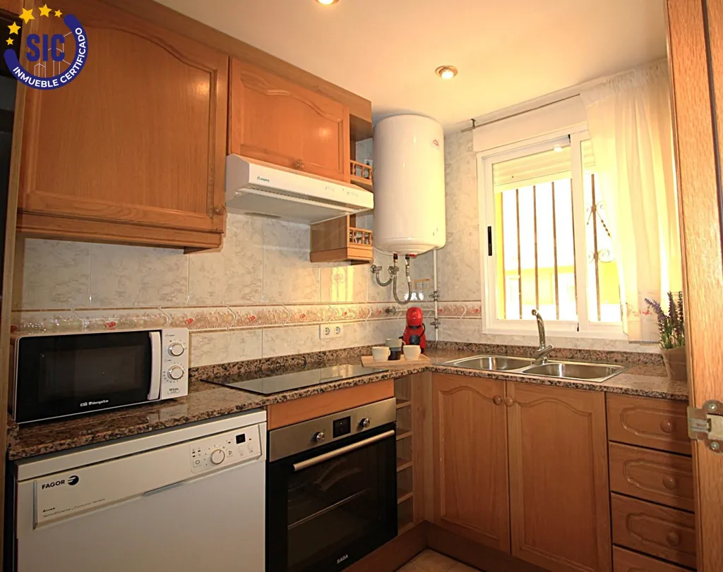 Köök - Beachfront Apartment with Sea View in Marina D'Or