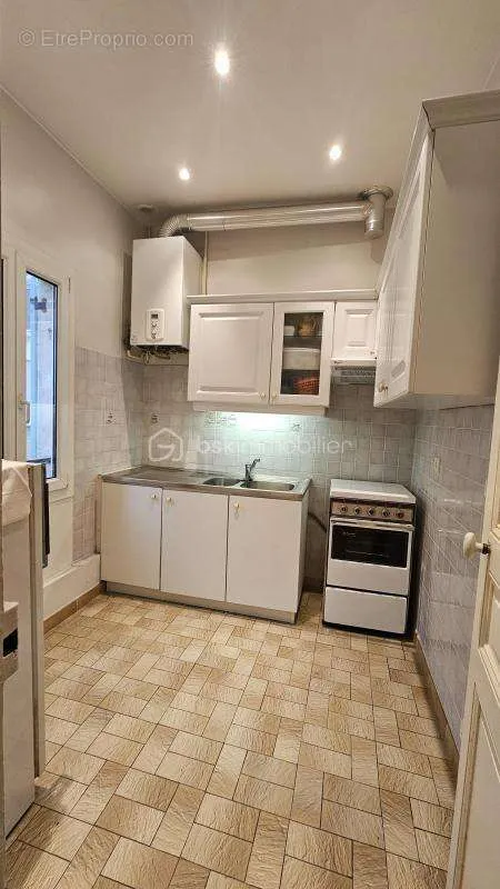 Cuisine - Appartement de Caractère au Cœur de la Ville