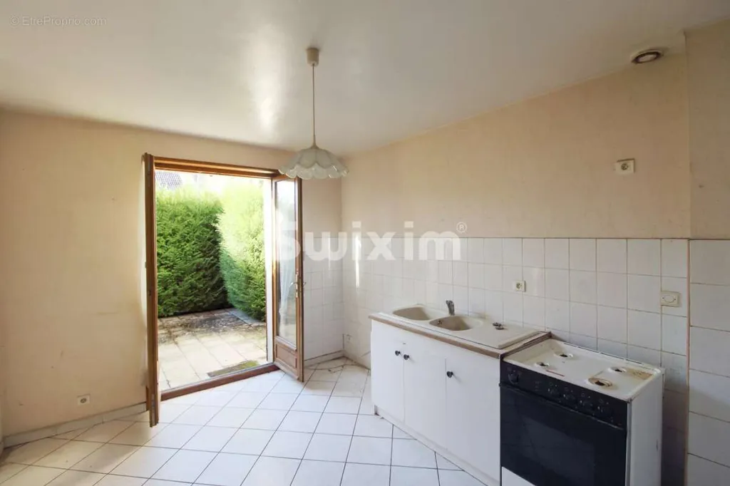 Kitchen - Four-Bedroom House with Garage in Rural Setting