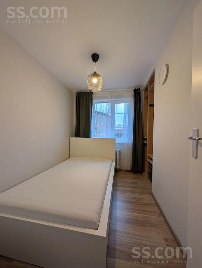 Schlafzimmer - 3-Bedroom Flat with Balcony in Āgenskalns