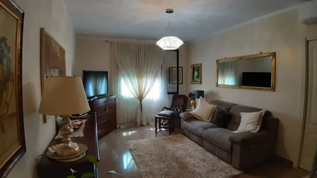 Soggiorno - Rearranged Apartment with Balcony in Guastalla