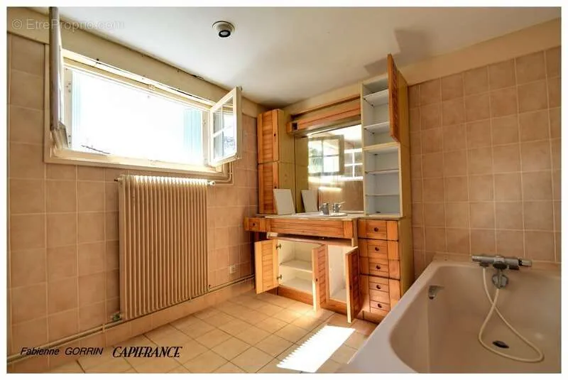 Bathrooms - Spacious House with Large Garage in Aigondigné