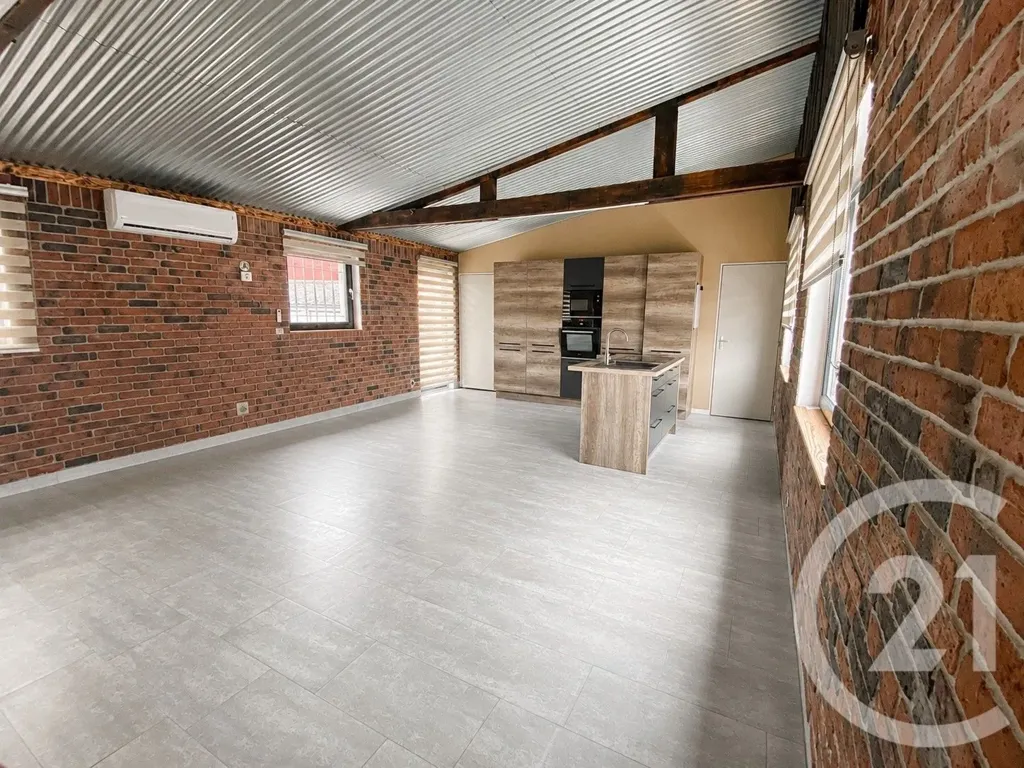 Cuisine - Appartement Moderne avec Jardin à Saint-Quentin