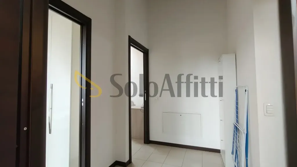 Esik - Mansarded Triplex with Balcony in Gallarate