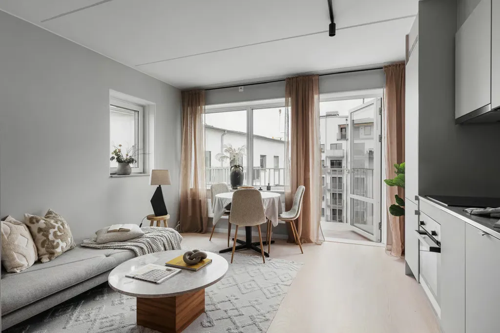 Séjour - Apartment with Balcony and Garden View in Malmö