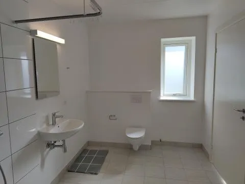 Bathrooms - Spacious 4-Room Apartment in Langeskov