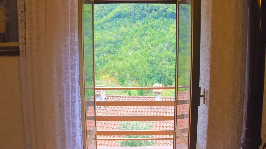 Rõdu - Rustic House with Terraced Garden in Comano