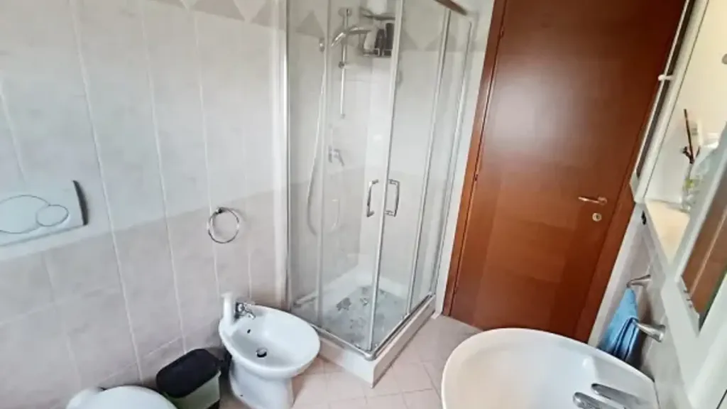 Bathrooms - Bright Apartment with Balcony in Avezzano