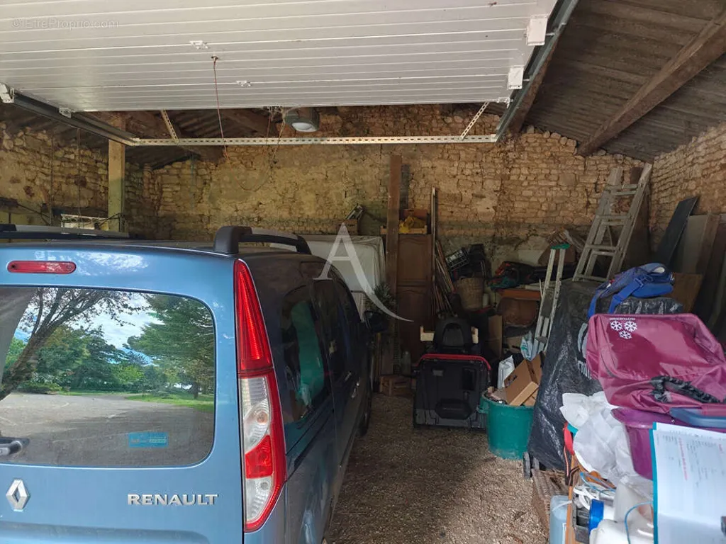 Garage - Architectural House with Pool in Breuil Magné