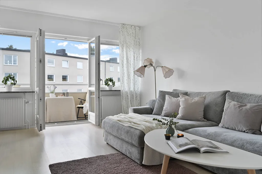 Living Room - Modern Apartment with South-Facing Balcony in Huddinge