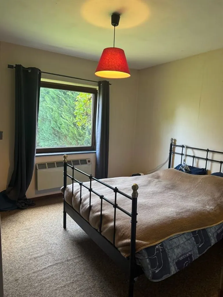 Schlafzimmer - Charming 2-Bedroom House with Garden in Quiet Area