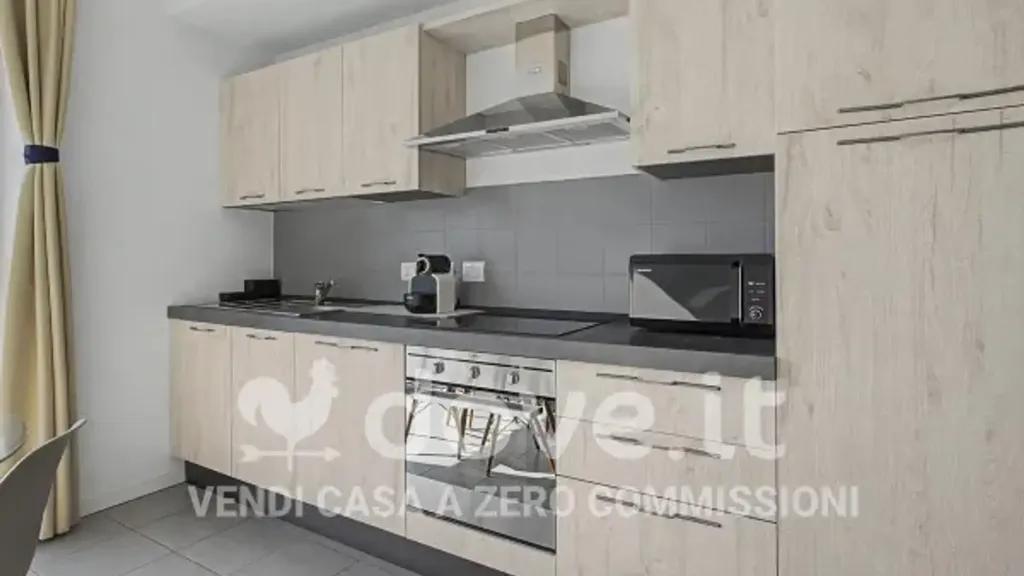 Kitchen - Modern Apartment with Balcony in Milan