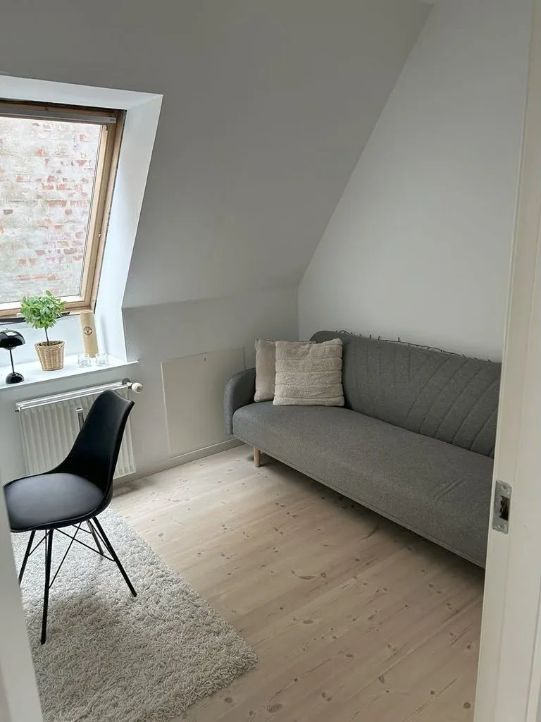 Living Room - Bright Apartment with Garden View in Haderslev