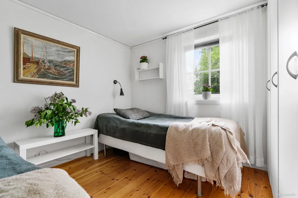 Schlafzimmer - Red Brick Cottage with Lake View in Sågmyra