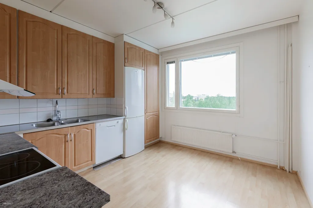 Cuisine - Spacious Apartment with West-Facing Balcony in Tampere