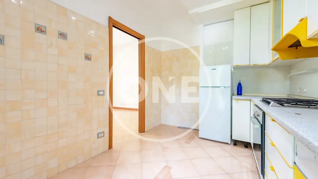 Cuisine - Three-Bedroom Apartment with Balcony in Rome