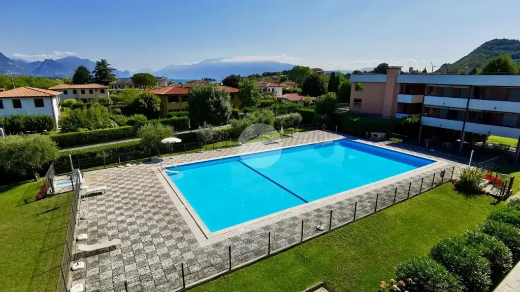 Piscine - Apartment with Pool View in Manerba del Garda