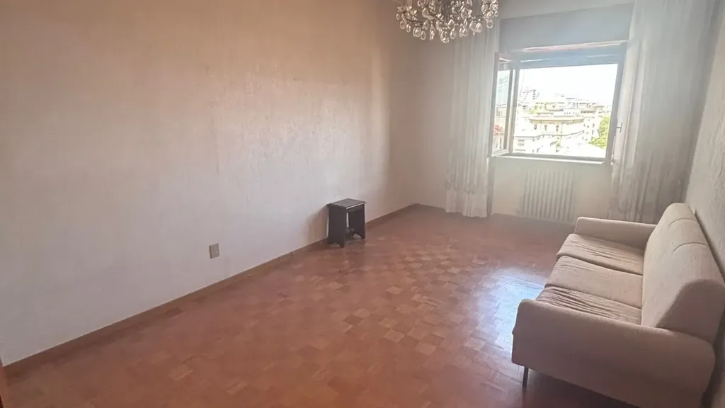 Séjour - Three-Bedroom Apartment with Balconies in Cosenza