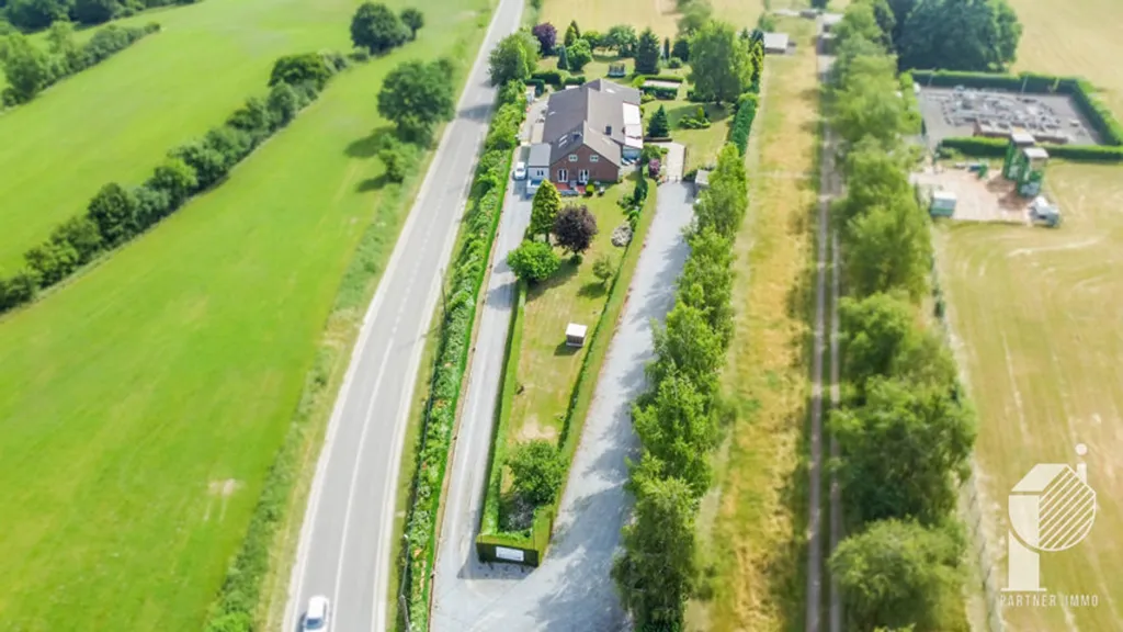 Õhuvaade - Mixed-Use Building with Residential and Commercial Space in Stembert