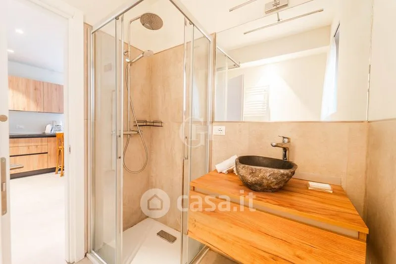 Bathrooms - Centrally Located Flat with Sea View in Torbole