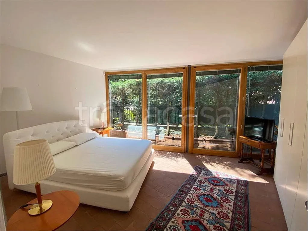 Camere da letto - Appartamento con vista lago e giardino a Faggeto Lario