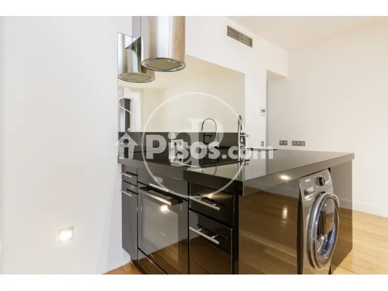 Kitchen - Modern Apartment with Balcony Views in Madrid Centre
