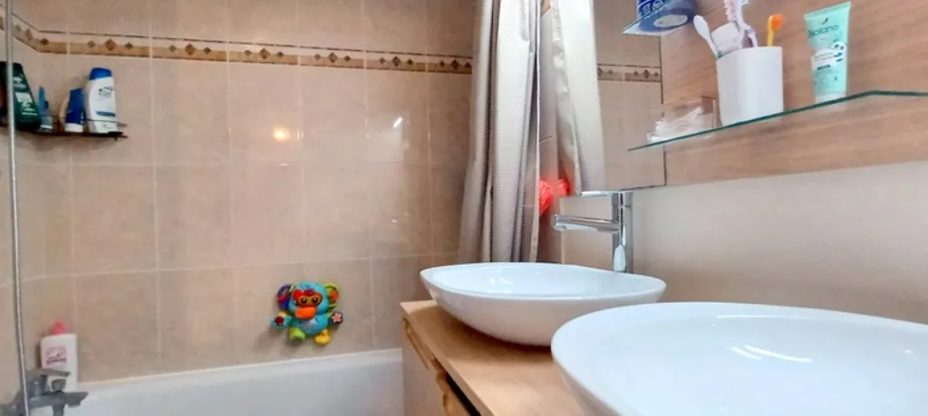 Bathrooms - Three-Bedroom Apartment with Terrace in Collonges