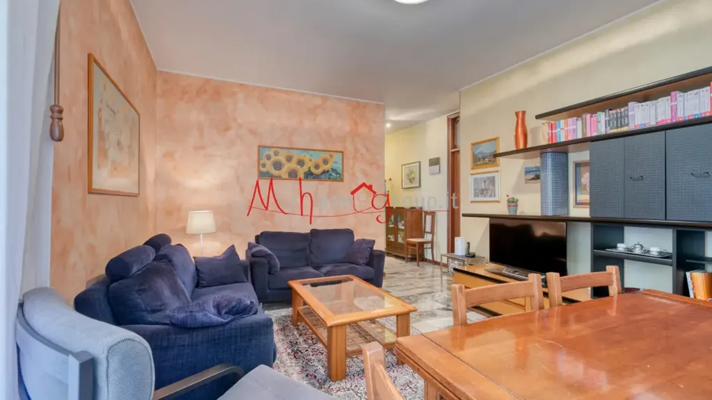 Living Room - Four-Bedroom Apartment with Balconies in Padova