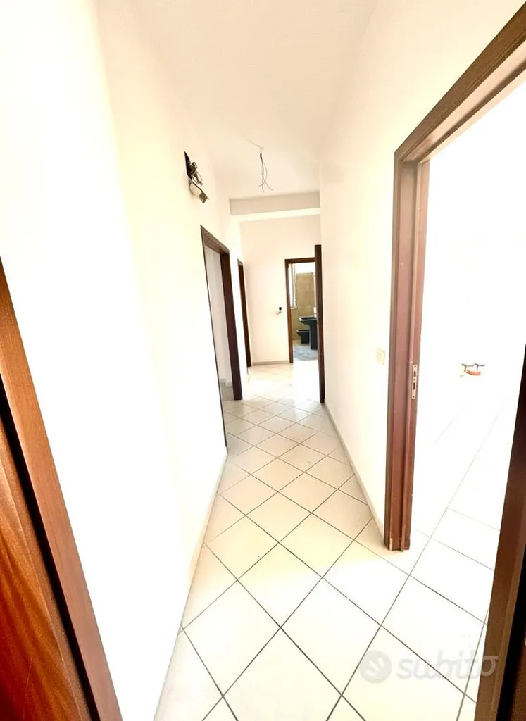Esik - Bright Apartment with Garage in Giarre
