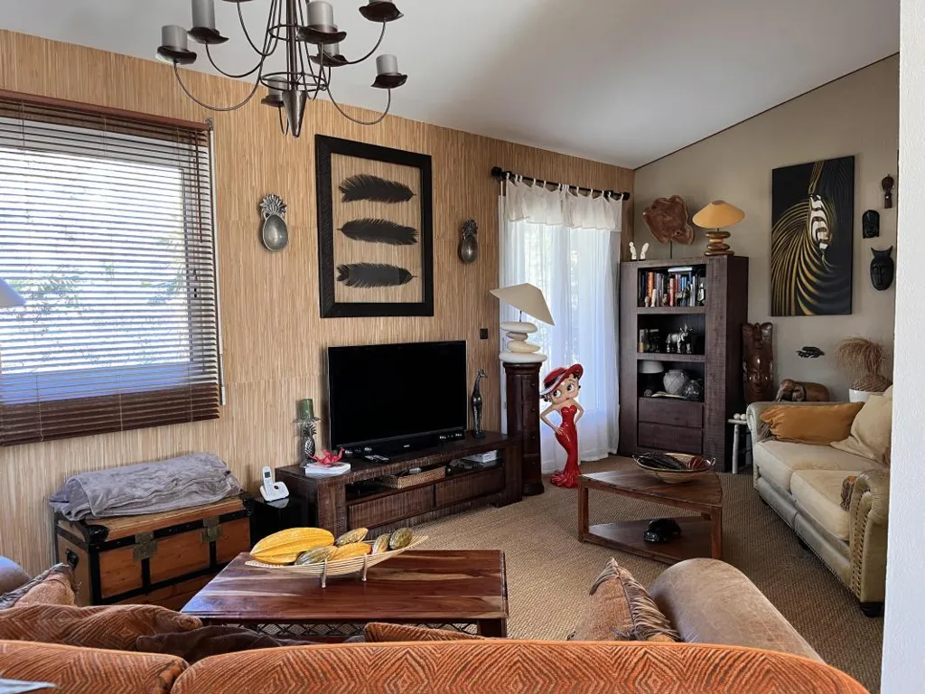Living Room - House with Mountain View in Verdant Setting