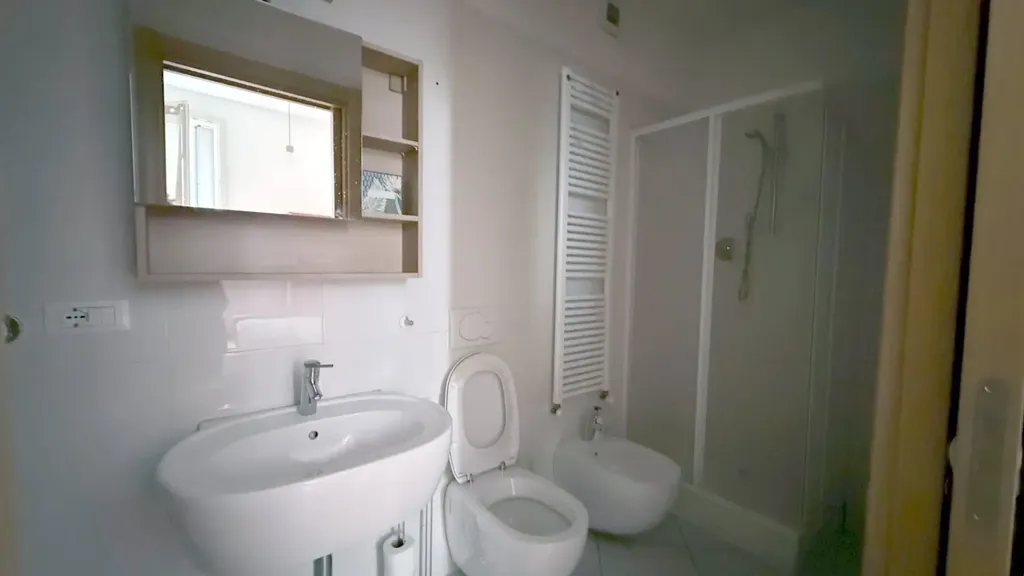 Bathrooms - Modernised Two-Bedroom Apartment in Bologna