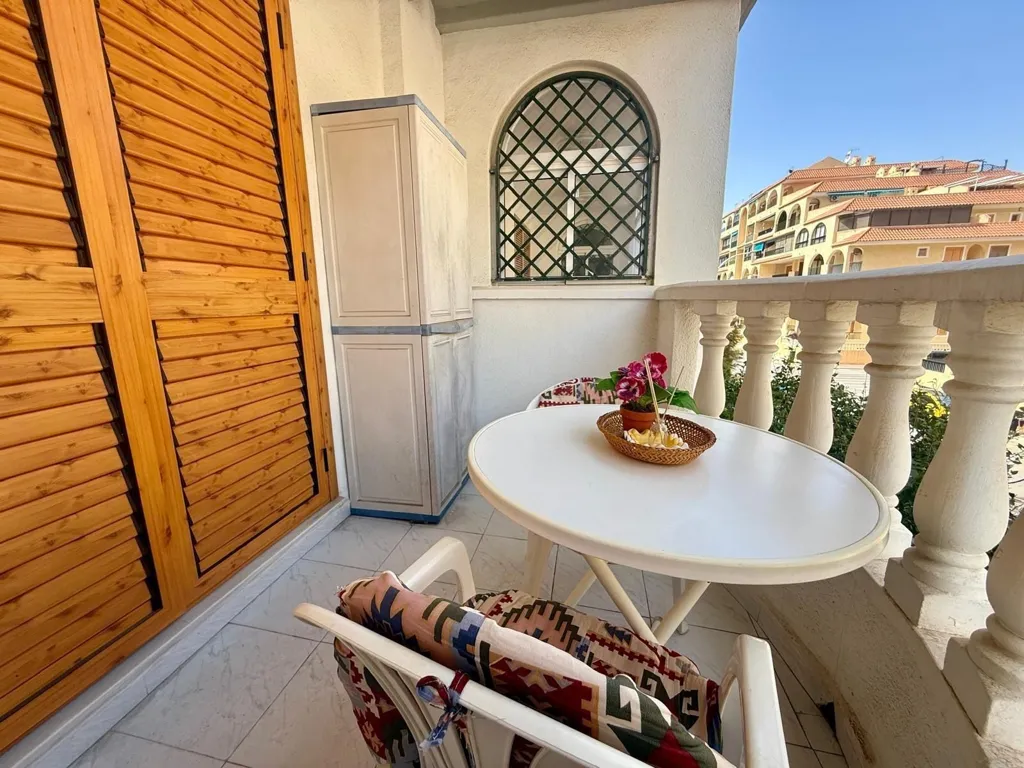Balcony - 1-Bedroom Apartment with Pool in Torrelamata