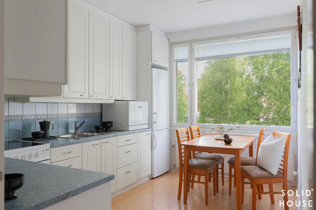 Dining Room - Spacious Apartment with Balcony in Laitila