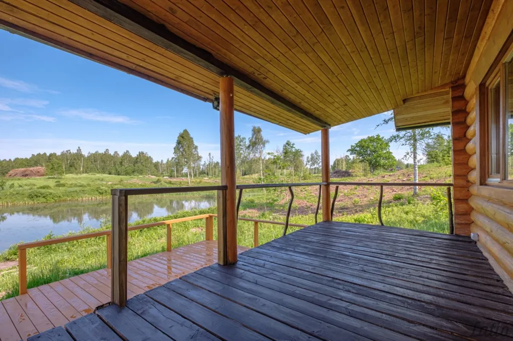 Terrasse - Wooden Cottage with Lake View in Cēsis District