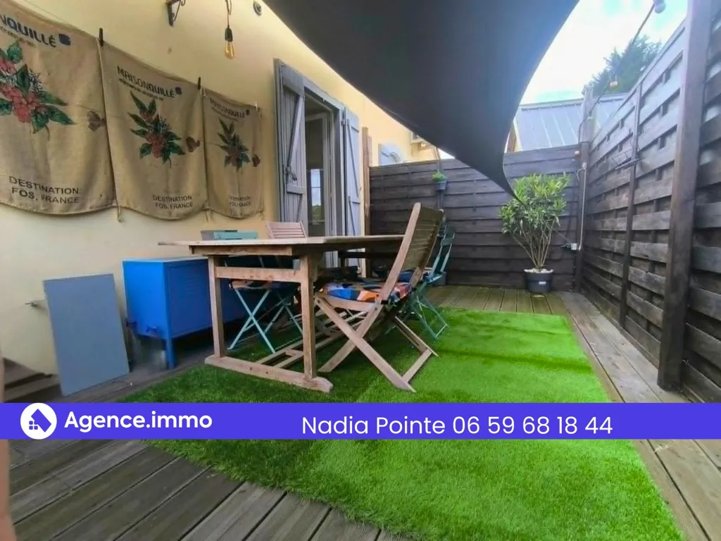 Terrasse - Appartement avec Terrasse et Garage à Limendous