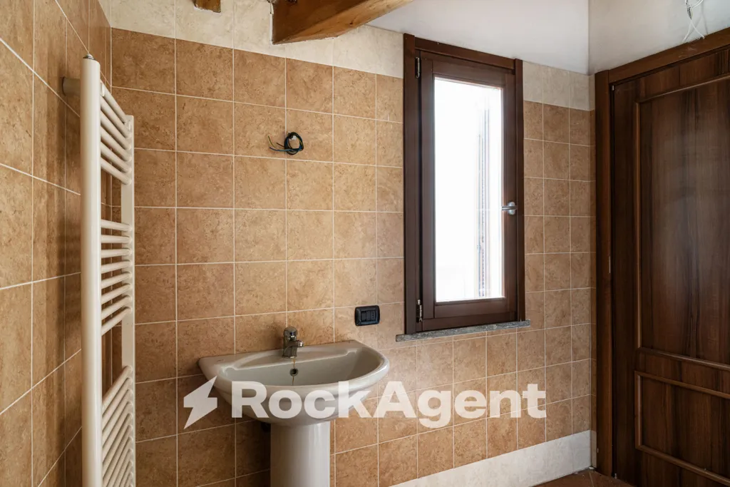 Bathrooms - First Floor Flat with Balcony in Camolino