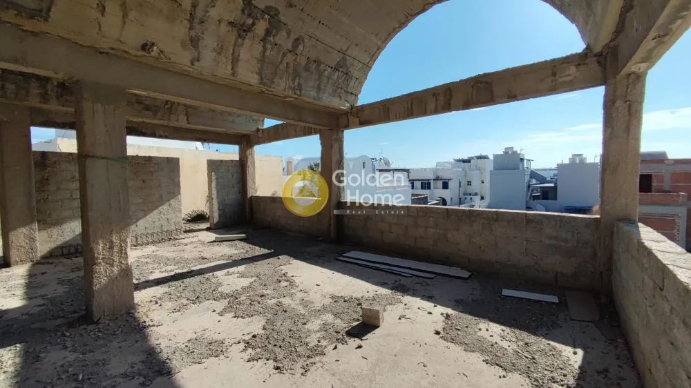Terrasse - Partially Completed Building with Seafront Proximity in Santorini
