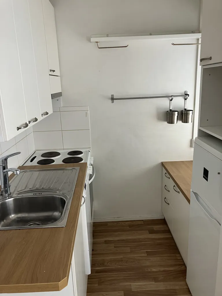 Köök - Bright Apartment with Balcony in Alppila, Helsinki