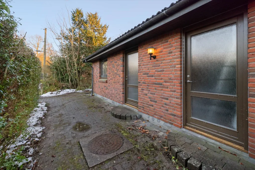 Välivaade - Terraced House with Brick Facade in Slangerup