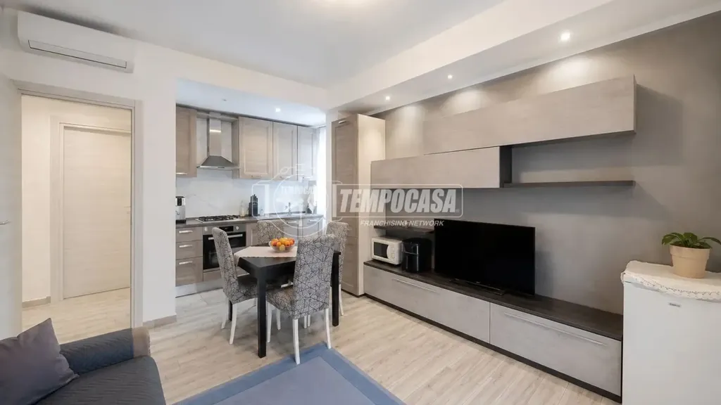 Séjour - Modernised Three-Bedroom Apartment in Muggiò