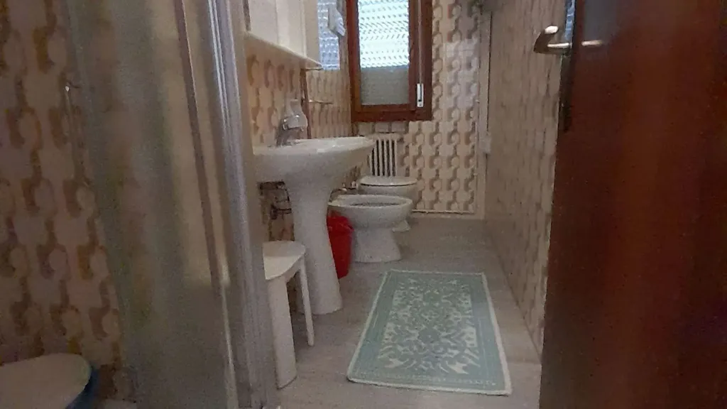 Salles de bain - Spacious 3-Bedroom Apartment in Jesolo