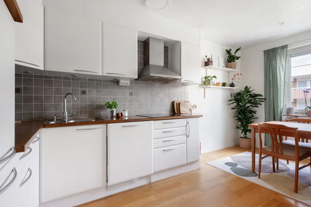 Cuisine - Renovated Apartment with West-Facing Balcony in Brynäs