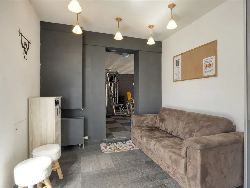 Elutuba - Mixed-Use Building with Lightwell in Kinrooi
