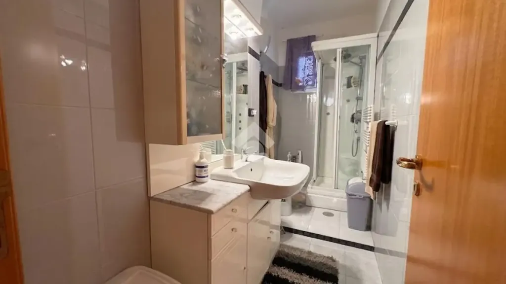 Bathrooms - Rusticated Two-Bedroom Apartment in Bari
