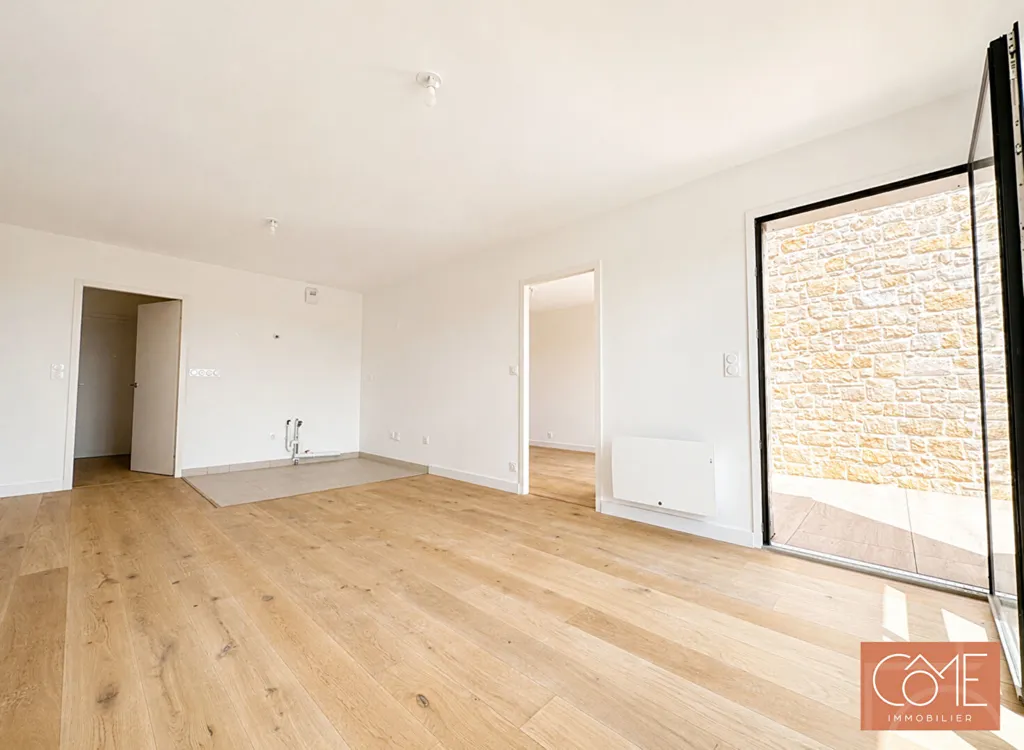 Pièces - Appartement avec Balcon au Centre de Saint-Grégoire