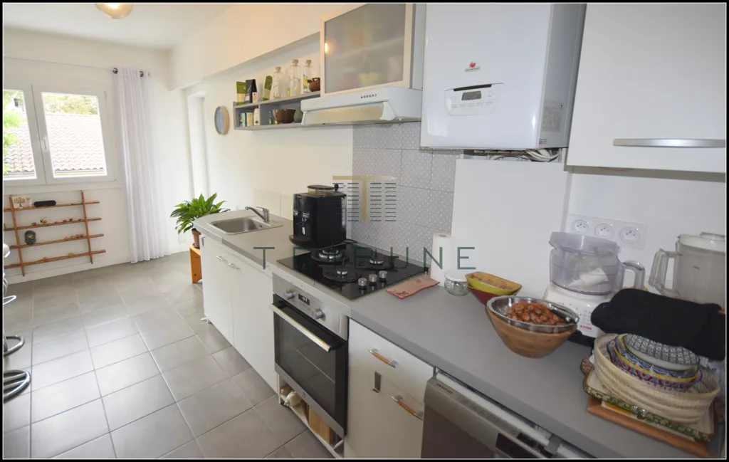 Cuisine - Appartement avec Garage et Terrasse dans le Quartier Recherché