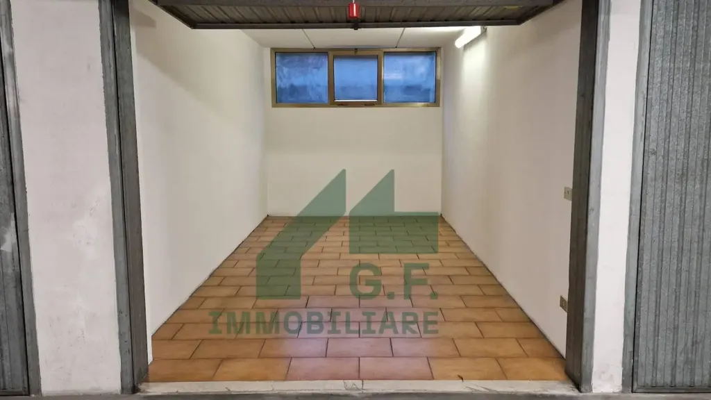 Garage - Apartment with Terrace in Lanzago Centre