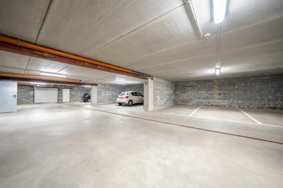 Garage - Appartement Neuf avec Terrasse à Libramont-Chevigny