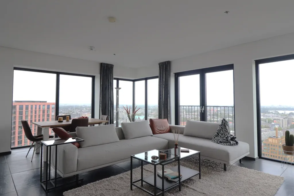 Living Room - Furnished Apartment with City View in Rotterdam