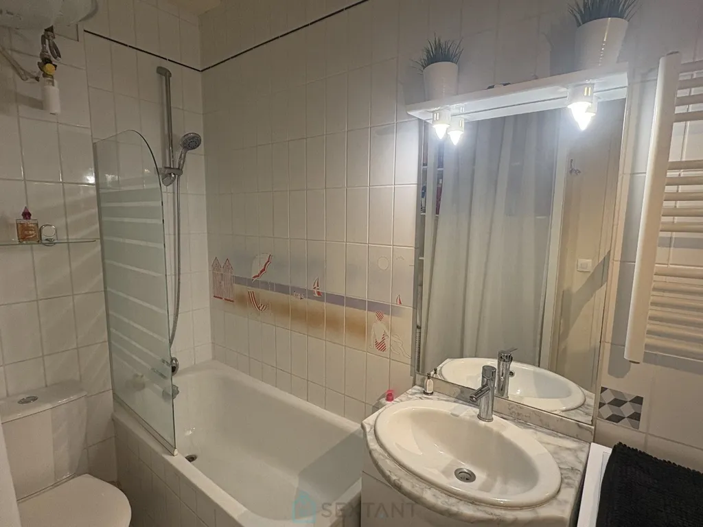 Salles de bain - Appartement avec Terrasse au Cœur de Cabourg